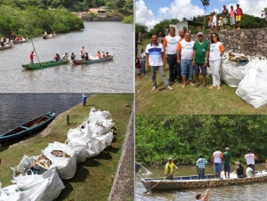 Voluntários realizam limpeza do Rio Cotinguiba